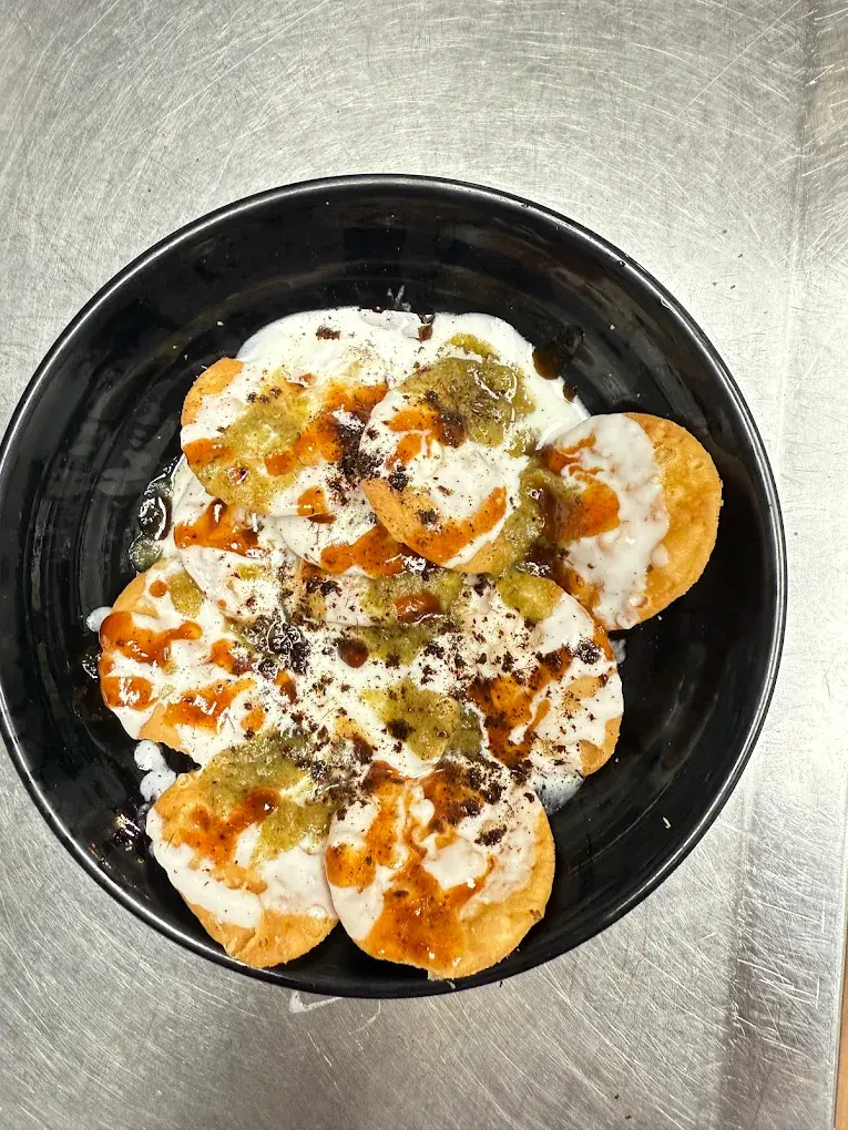 Delhi Plate with butter chicken at Delhi Cafe Edmonton